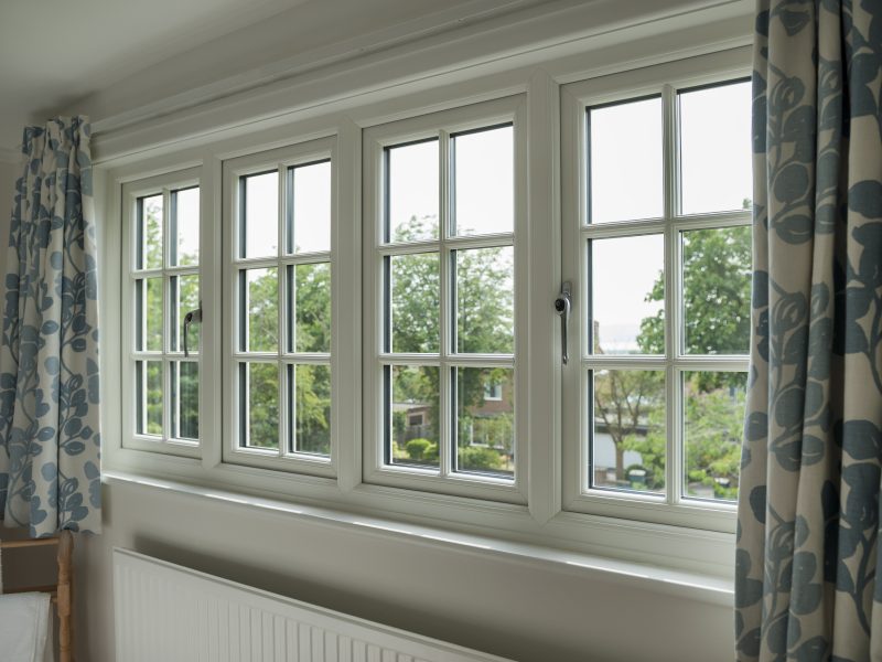 white pvc windows with georgian bar